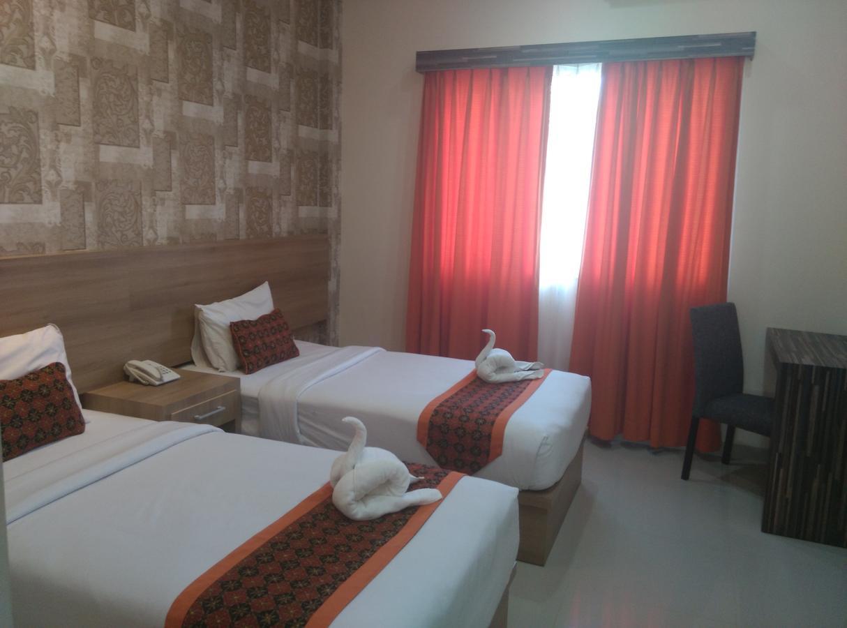 New D'Dhave Hotel 巴东 外观 照片